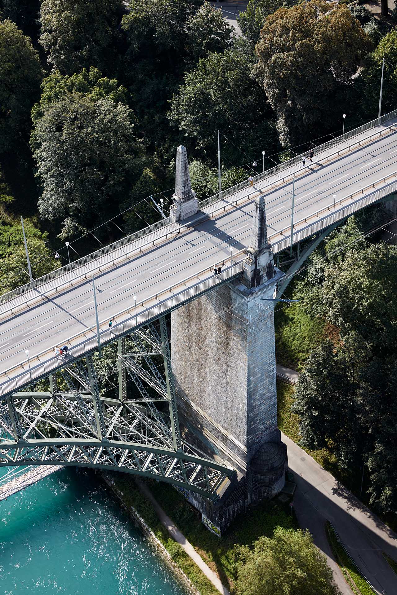 historic bridge over river with safety net